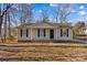 House exterior featuring a neutral color scheme and landscaping at 116 Westover Ave, Kannapolis, NC 28081