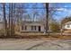 Single story home with a front yard and mature trees at 116 Westover Ave, Kannapolis, NC 28081