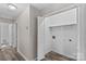 Small laundry room with built-in shelving at 116 Westover Ave, Kannapolis, NC 28081