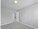 Carpeted bedroom with an open door to another room at 11615 Kingsley View Dr, Charlotte, NC 28277