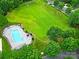 Community pool and large green space at 11615 Kingsley View Dr, Charlotte, NC 28277