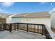 Backyard with deck, string lights and view of storage units at 12515 Bryton Ridge Pkwy, Huntersville, NC 28078