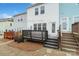 Backyard with deck, string lights and small yard at 12515 Bryton Ridge Pkwy, Huntersville, NC 28078