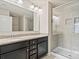 Bathroom with double vanity, granite countertops, and a large shower at 12515 Bryton Ridge Pkwy, Huntersville, NC 28078