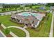 Aerial view of community pool, clubhouse, and playground at 12515 Bryton Ridge Pkwy, Huntersville, NC 28078