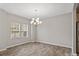 Bright dining room with hardwood floors and a chandelier at 12515 Bryton Ridge Pkwy, Huntersville, NC 28078