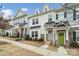 Three-story townhome with multiple color siding options and stone accents at 12515 Bryton Ridge Pkwy, Huntersville, NC 28078