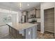 Modern kitchen with ample cabinet space and pantry at 12515 Bryton Ridge Pkwy, Huntersville, NC 28078