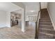 Open concept kitchen with stainless steel appliances and gray cabinetry at 12515 Bryton Ridge Pkwy, Huntersville, NC 28078