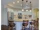 Bright kitchen featuring a large island, stainless steel appliances, and ample counter space, perfect for cooking at 1255 Restoration Dr, Waxhaw, NC 28173