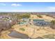 Aerial view of country club with pools and tennis courts at 12835 Cadgwith Cove Dr, Huntersville, NC 28078