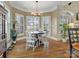 Bright breakfast nook with built-in seating and hardwood floors at 12835 Cadgwith Cove Dr, Huntersville, NC 28078