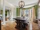 Dining room with a farmhouse table and built-in cabinetry at 12835 Cadgwith Cove Dr, Huntersville, NC 28078