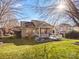 House exterior with large backyard and patio at 12835 Cadgwith Cove Dr, Huntersville, NC 28078