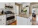 Modern kitchen featuring stainless steel appliances and granite countertops at 12835 Cadgwith Cove Dr, Huntersville, NC 28078