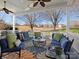 Relaxing patio with seating area and outdoor rug at 12835 Cadgwith Cove Dr, Huntersville, NC 28078