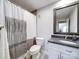 Clean bathroom featuring a shower/tub combo and granite vanity at 1323 Queens Rd # 407, Charlotte, NC 28207