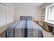 Spacious bedroom with built-in shelving and window seat at 1323 Queens Rd # 407, Charlotte, NC 28207