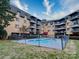 Building exterior with a well-maintained pool area at 1323 Queens Rd # 407, Charlotte, NC 28207