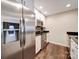 Stainless steel appliances and granite countertops in a modern kitchen at 1323 Queens Rd # 407, Charlotte, NC 28207