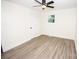 Simple bedroom with wood-look floors and ceiling fan at 139 Elysian Dr, Mooresville, NC 28117