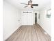 Bedroom with barn door closet and ceiling fan at 139 Elysian Dr, Mooresville, NC 28117