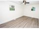 Simple bedroom with wood-look floors and ceiling fan at 139 Elysian Dr, Mooresville, NC 28117