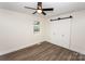 Bedroom with ceiling fan and barn door closet at 139 Elysian Dr, Mooresville, NC 28117