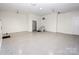 Bright and spacious garage with epoxy flooring and convenient interior access at 139 Elysian Dr, Mooresville, NC 28117