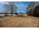 Relaxing lakeside gazebo with picnic tables, perfect for outdoor entertaining at 139 Elysian Dr, Mooresville, NC 28117