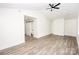 Main bedroom with vaulted ceiling, hardwood floors, and barn door at 139 Elysian Dr, Mooresville, NC 28117