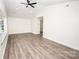 Main bedroom with vaulted ceiling, hardwood floors, and closet at 139 Elysian Dr, Mooresville, NC 28117