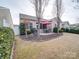 Patio with seating area, grill, and partially fenced yard at 156 Carmen Way # 70, Lancaster, SC 29720