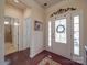 Bright entryway with hardwood floors and a view into a bathroom at 156 Carmen Way, Lancaster, SC 29720