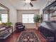 Home office with hardwood floors, a comfortable chair, and built-in bookcase at 156 Carmen Way, Lancaster, SC 29720