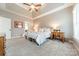 Bright bedroom with carpeted floor and ceiling fan at 15604 Wynford Hall St, Huntersville, NC 28078