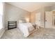 Spacious bedroom with double bed and neutral color palette at 15604 Wynford Hall St, Huntersville, NC 28078