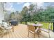 Relaxing deck with seating area and a grill at 15604 Wynford Hall St, Huntersville, NC 28078