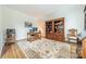 Home office with built-in shelving and hardwood floors at 15604 Wynford Hall St, Huntersville, NC 28078