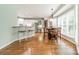 Bright kitchen features stainless steel appliances and white cabinetry at 15604 Wynford Hall St, Huntersville, NC 28078