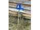 Blue outdoor water spigot mounted on a wooden block at 166 Cheryls Pass None, Love Valley, NC 28625