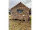 Wooden cabin exterior showcasing rustic charm and natural wood tones at 166 Cheryls Pass None, Love Valley, NC 28625