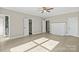 Main bedroom with hardwood floors, ceiling fan, and walk-in closet at 200 Church Dr, Shelby, NC 28150