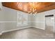 Empty dining room with wood ceiling and hardwood floors at 200 Church Dr, Shelby, NC 28150