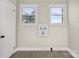 Laundry room with two windows, vinyl flooring, and utility hookups at 200 Church Dr, Shelby, NC 28150