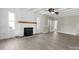 Living room with stone fireplace and hardwood floors at 200 Church Dr, Shelby, NC 28150