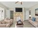 Living room with stone fireplace and neutral color palette at 200 Church Dr, Shelby, NC 28150