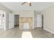 Living room with stone fireplace and hardwood floors at 200 Church Dr, Shelby, NC 28150