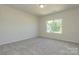 Well-lit bedroom featuring a window and neutral wall color at 2238 Catawba Trace Dr, Catawba, NC 28609