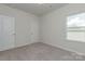 Charming bedroom with window, neutral walls, and carpet flooring at 2238 Catawba Trace Dr, Catawba, NC 28609